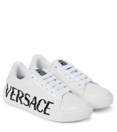 Shop Versace Logo Leather Sneakers In Bianco+nero
