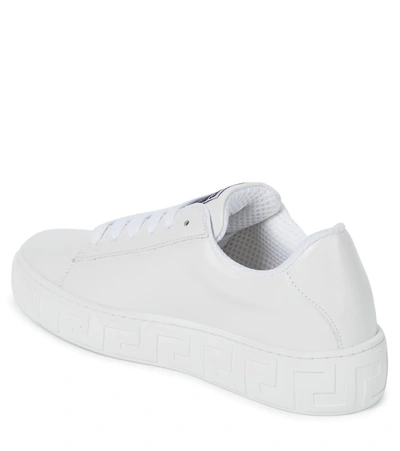 Shop Versace Logo Leather Sneakers In Bianco+nero