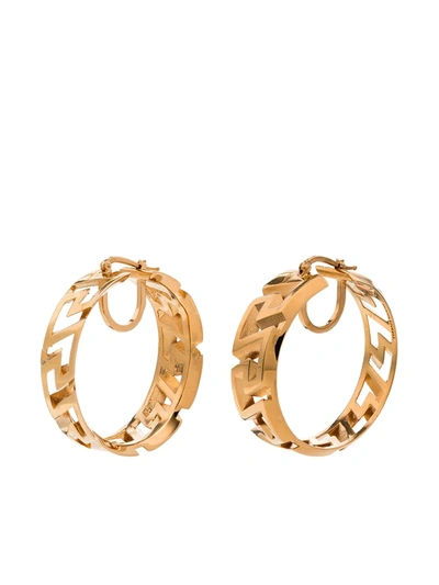 Shop Versace Greca Pattern Hoop Earrings In Gold