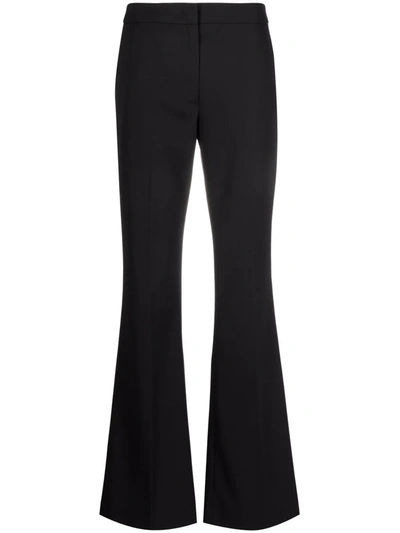 Shop Msgm High-waisted Flared Leg Trousers In Black