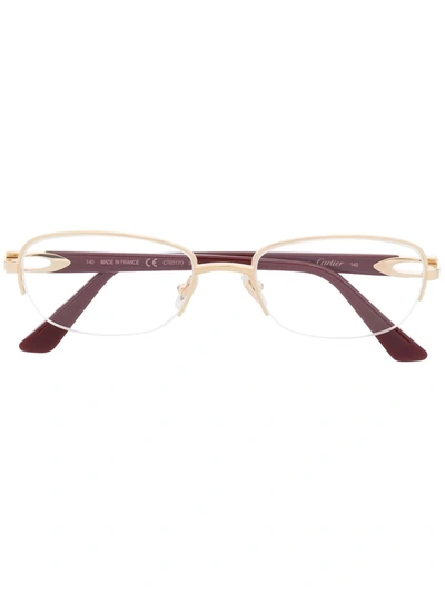 Shop Cartier Oval Frame Glasses In Red