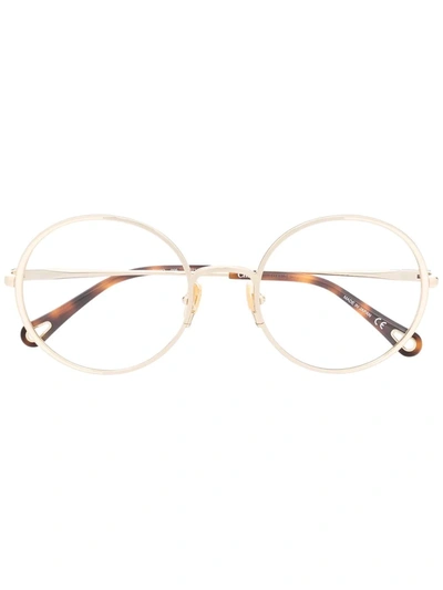 Shop Chloé Round Frame Glasses In Gold