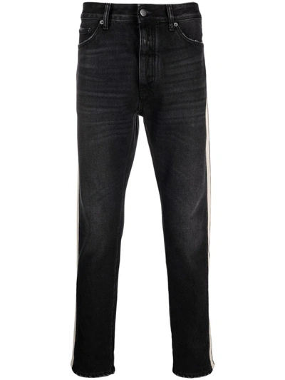 Shop Palm Angels Side Striped Slim-fit Jeans In Black