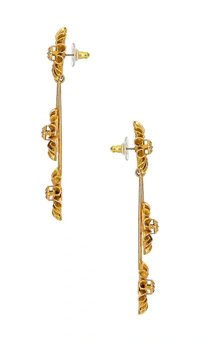 Shop Elizabeth Cole Triple Flower Earrings In Metallic Gold