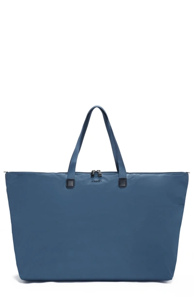 Shop Tumi Voyageur Just In Case® Packable Nylon Tote In Dusty Blue
