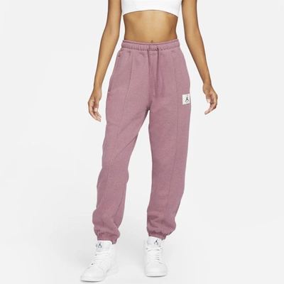 Shop Jordan Essentials Women's Fleece Pants In Light Mulberry,heather,cave Purple