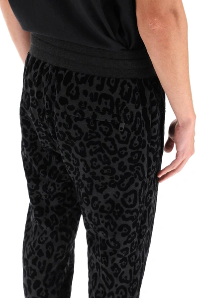 Shop Dolce & Gabbana Flocked Leopard Joggers In Black