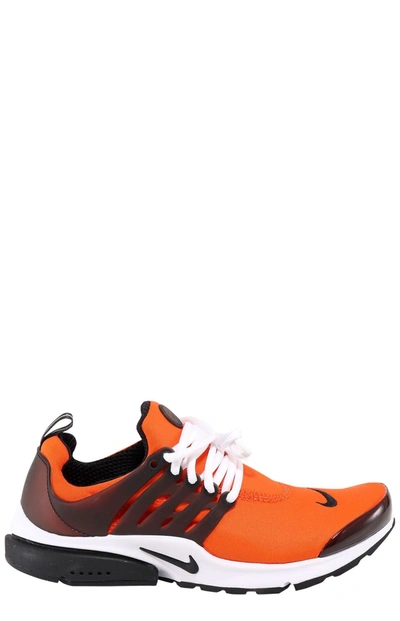 Shop Nike Air Presto Sneakers In Orange