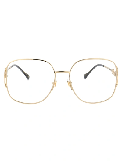 Shop Gucci Gg1019o Glasses In 001 Gold Gold Transparent