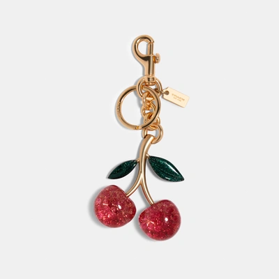 Shop Coach Signature Cherry Bag Charm In Pink
