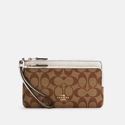 Shop Coach Double Zip Wallet In Signature Canvas In Beige