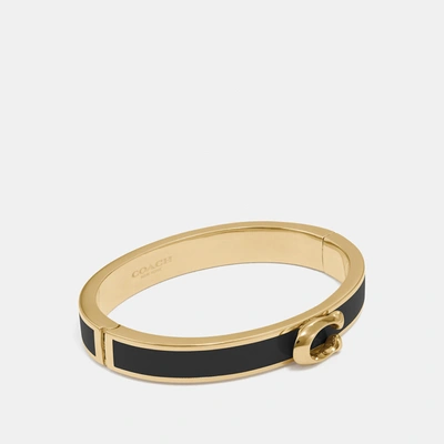 Shop Coach Signature Push Hinged Bangle In Black