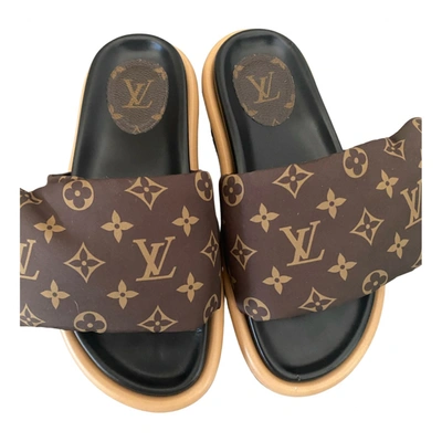 Pre-owned Louis Vuitton Pool Pillow Leather Mules In Brown