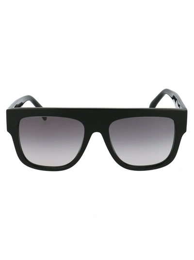 Shop Alaïa Alaia Sunglasses In 001 Black Black Grey