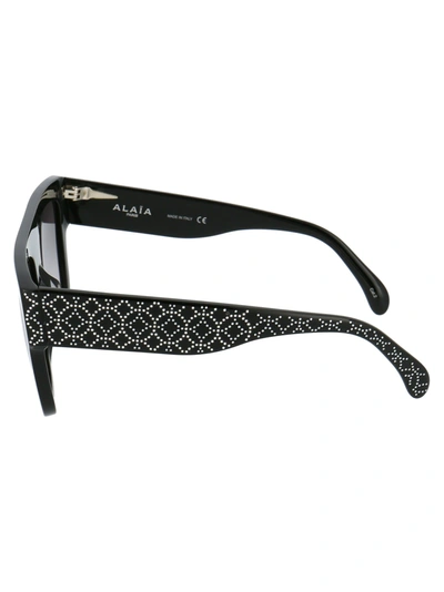 Shop Alaïa Alaia Sunglasses In 001 Black Black Grey