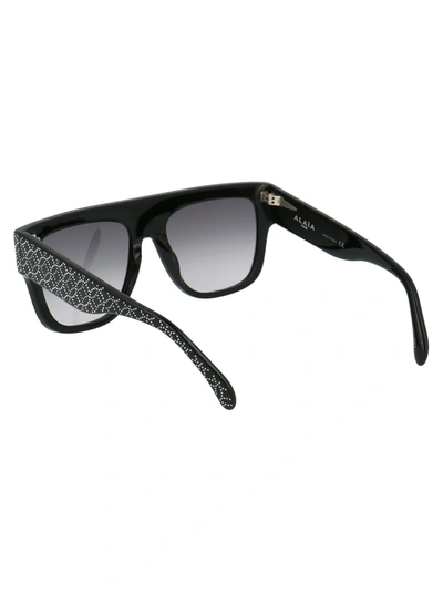 Shop Alaïa Alaia Sunglasses In 001 Black Black Grey