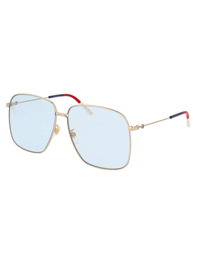 Shop Gucci Sunglasses In 006 Gold Gold Light Blue