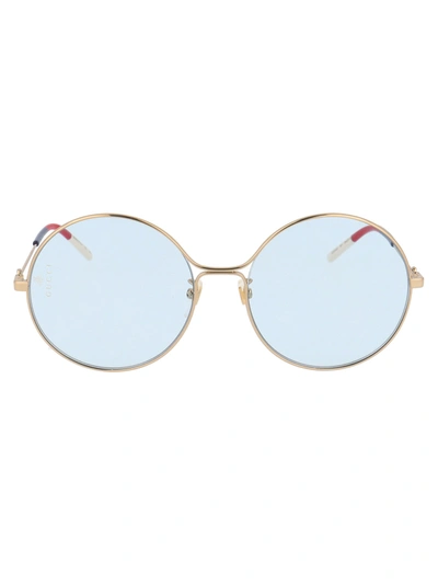 Shop Gucci Sunglasses In 006 Gold Gold Light Blue