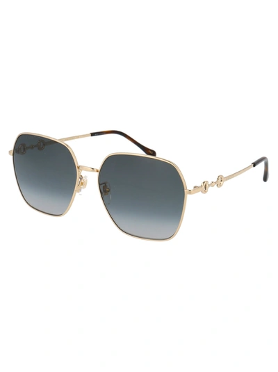 Shop Gucci Eyewear Sunglasses In 001 Gold Gold Grey
