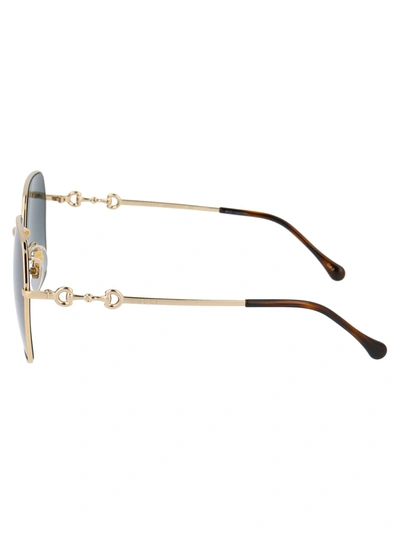 Shop Gucci Eyewear Sunglasses In 001 Gold Gold Grey