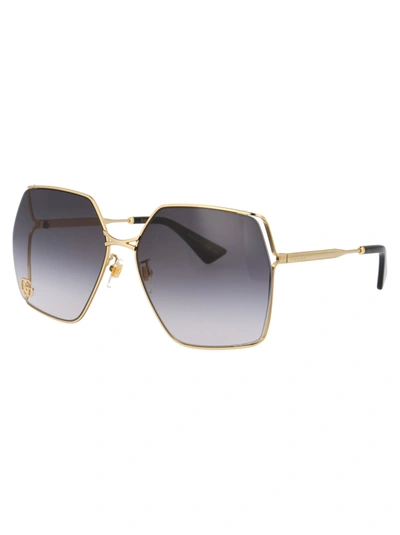 Shop Gucci Sunglasses In 006 Gold Gold Grey