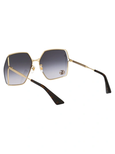 Shop Gucci Sunglasses In 006 Gold Gold Grey