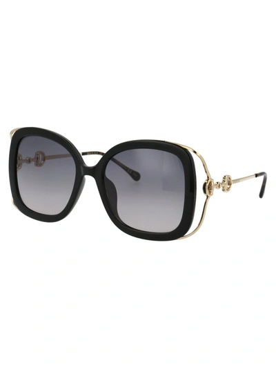 Shop Gucci Sunglasses In 002 Black Gold Grey