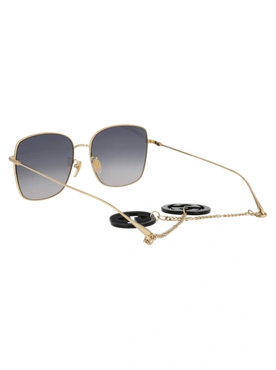 Shop Gucci Eyewear Sunglasses In 001 Gold Gold Grey