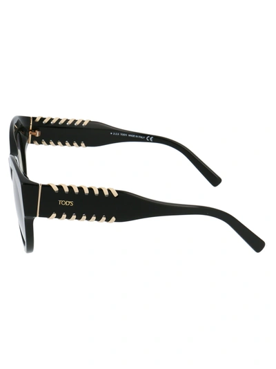 Shop Tod's Sunglasses In 01c Black