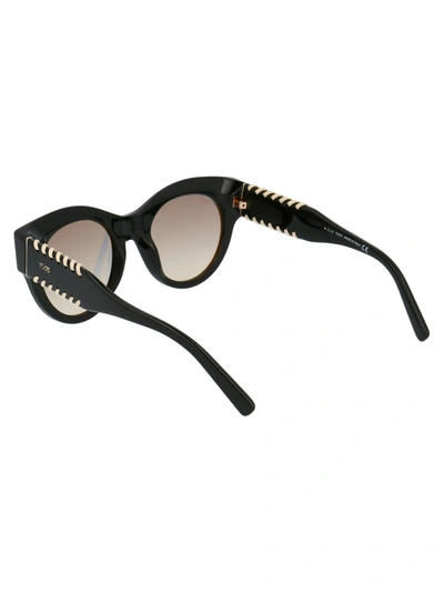 Shop Tod's Sunglasses In 01c Black