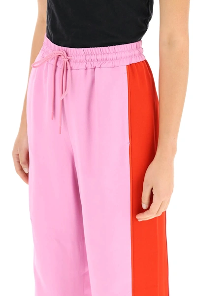 Shop Burberry Wide Leg Trousers In Pink,red