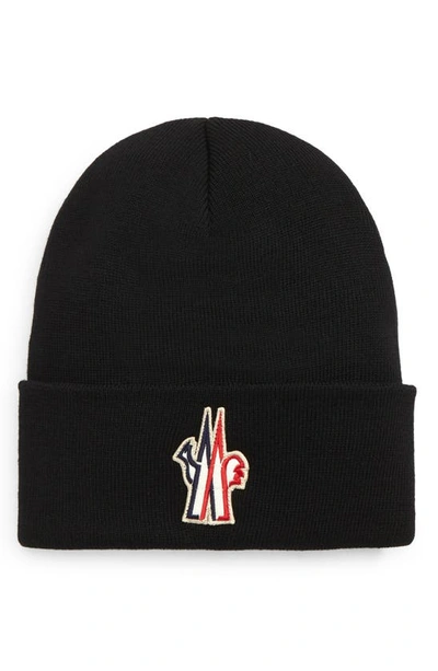 Shop Moncler Embroidered Logo Rib Wool Beanie In Black