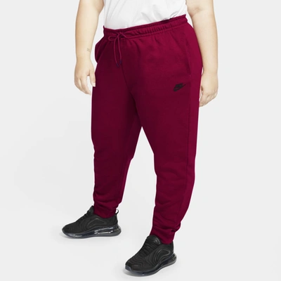 Shop Nike Sportswear Essential Women's Fleece Pants In Pomegranate,black