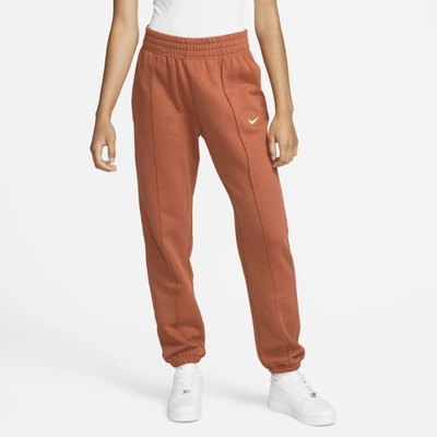 Shop Nike Sportswear Essential Collection Women's Fleece Pants In Burnt Sunrise,white