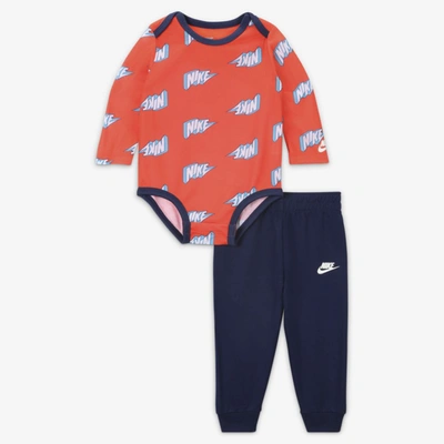 Shop Nike Baby (0-9m) Bodysuit And Pants Set In Blue