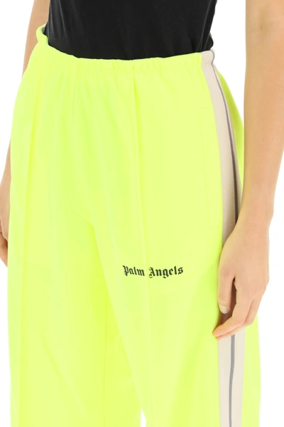 Shop Palm Angels Loose Trackpants In Yellow