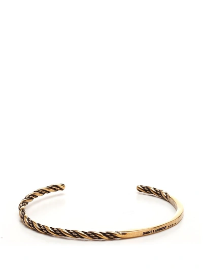 Shop Saint Laurent Twisted Cuff Bracelet In Gold