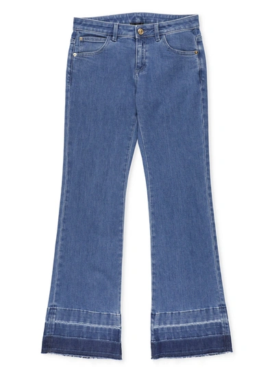 Shop Versace Kids Raw Hem Flared Jeans In Blue