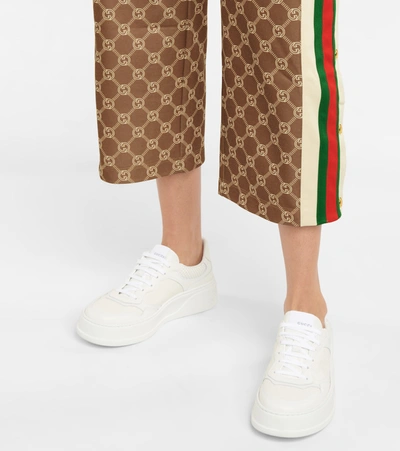 Shop Gucci Gg Embossed Leather Sneakers In G.whi/g.whi/g.wh/g.w