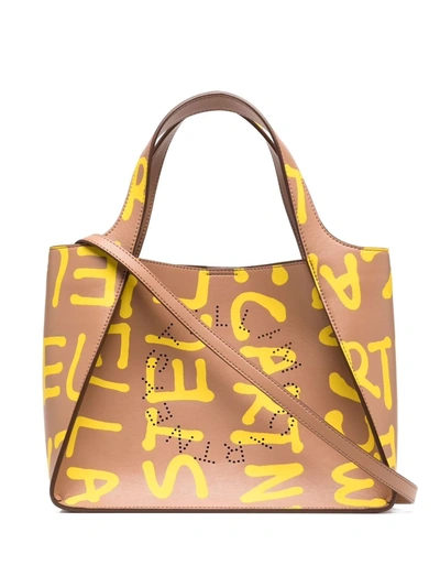 Shop Stella Mccartney Stella Logo Graffiti Tote Bag In Brown