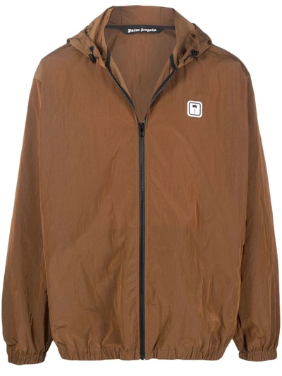 Shop Palm Angels Pxp Hooded Windbreaker Jacket In Brown