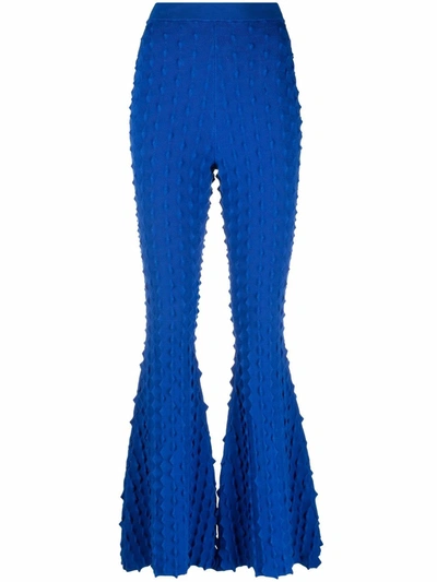 Shop Stella Mccartney Textured-knit Flared Trousers In Blue