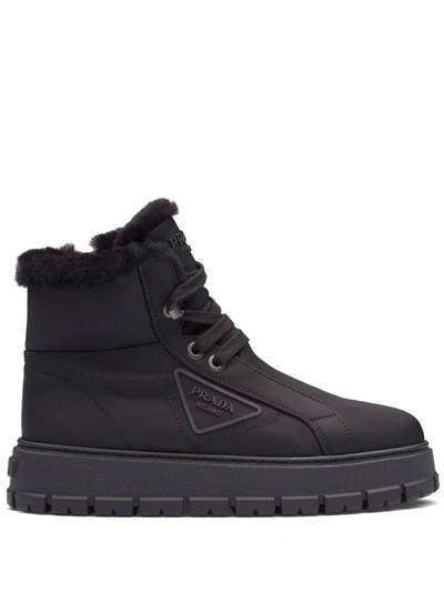 Shop Prada Triangle-logo Ankle Boots In Black