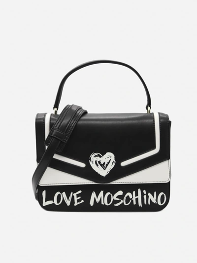 Shop Love Moschino Handbag With Contrasting Logo Print In Black, White