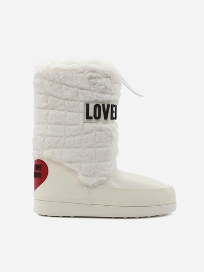 Shop Love Moschino Faux Fur Ankle Boots With Contrasting Logo Lettering In White