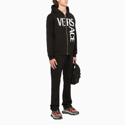 Shop Versace Black Sweatshirt With Contrasting Logo Print