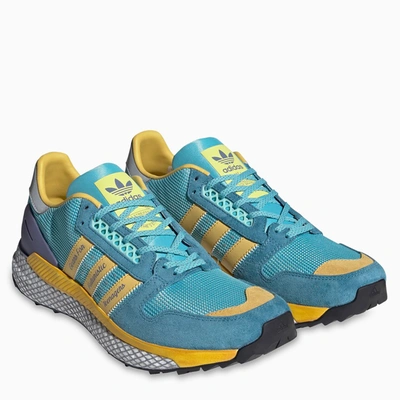 Shop Adidas Statement Light Blue/yellow Questar Human Made Sneakers