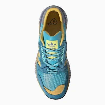 Shop Adidas Statement Light Blue/yellow Questar Human Made Sneakers