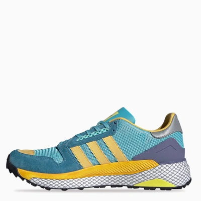 Shop Adidas Statement Light Blue/yellow Questar Human Made Sneakers