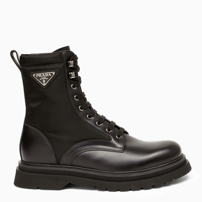 Prada Logo-plaque Panelled Ankle Boots In Black